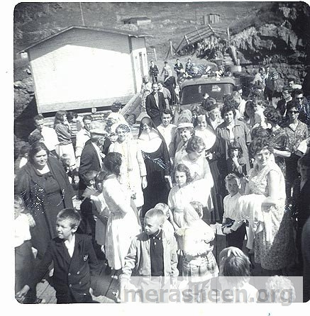 Waiting for the steamer on the government wharf in 1965.&amp;nbsp; Obviously a big event with so many people and must be a Sunday with everyone wearing their best. Note the light poles to the left of Ron Pitcher by Kevin Pomroy's truck.&amp;nbsp; Some of the people include Billy Houlihan, Margaret Wilson, Jimmy Wilson, Bill &amp;amp; Theresa Pomroy, Sister Ida, Mrs. Charlie Pittman, Sister Nellie, Pearl Best, Doris Pomroy.&amp;nbsp;