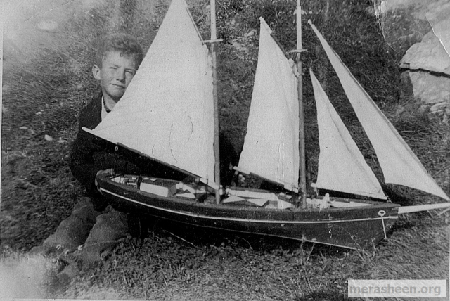 Ernie Walsh and his prized boat built by his brother John.