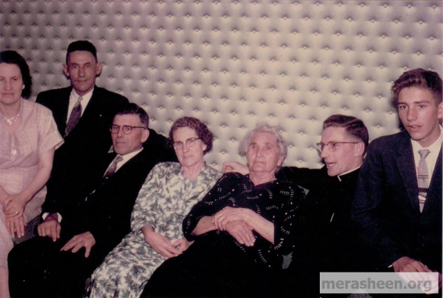 Laura, Vic, Din Pat, Mame, Grandmother Ennis, Father Denis (just ordained) and Ernie