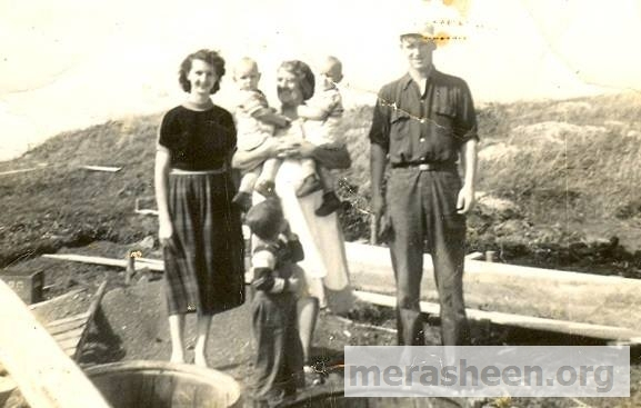 Mary Pitcher, Bride Fulford holding Billy and Gerry, and Ron Pitcher building his house 1954