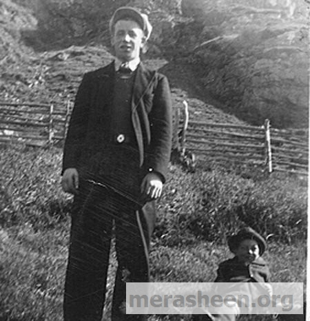 Mickey Connors with a young Paddy Ennis on the grass