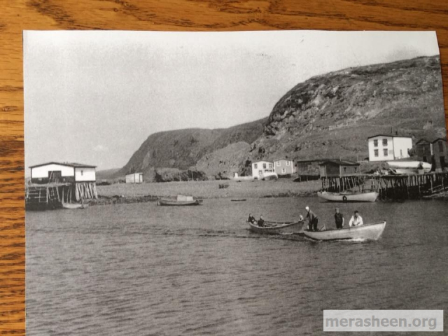 Tom Ennis, Joe, Ron Pitcher Sr, Carl returning to the harbour with Billy and Gerry who were out past the Fish Rock in Jimmy Barrett's dory 1963
