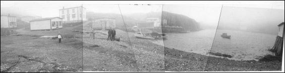 57 A foggy view of Wilson's beach between Johnny Wilson's house on the left and George Wilson's stage on the right.